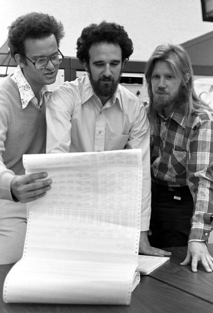 Martin Hellman (center) and Whitfield Diffie (right), shown here in a 1977 photo with Ralph Merkle, wrote a seminal paper that linked one-way functions to cryptography.